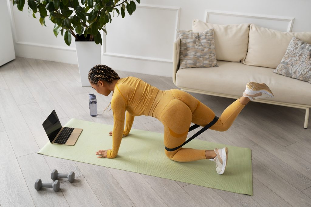 full-shot-woman-training-with-laptop-1024x683